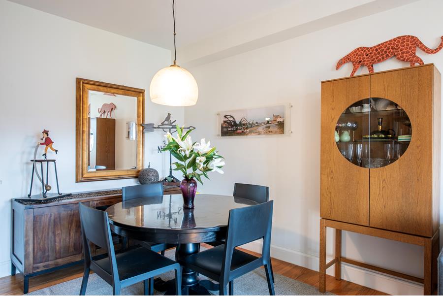 1885 Lexington Avenue, Unit 6D Manhattan, NY 10035 - Photo 4 of 7 a dining room with furniture and window