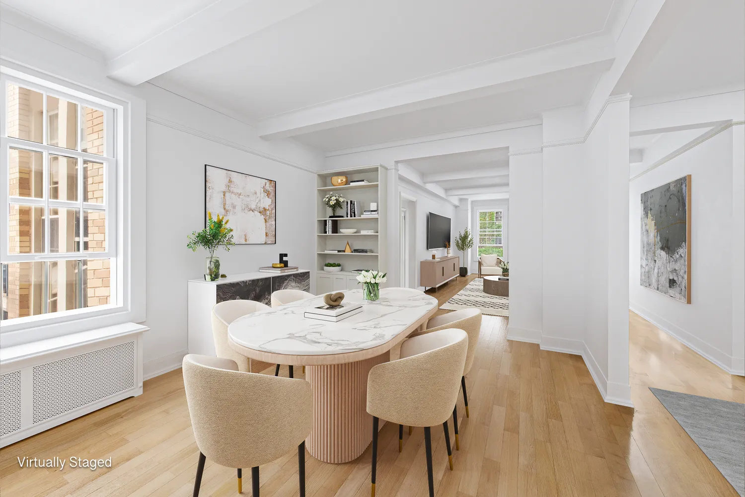 a dining room with furniture a window and wooden floor