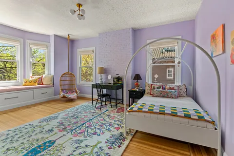 a room that has a table and chairs in it