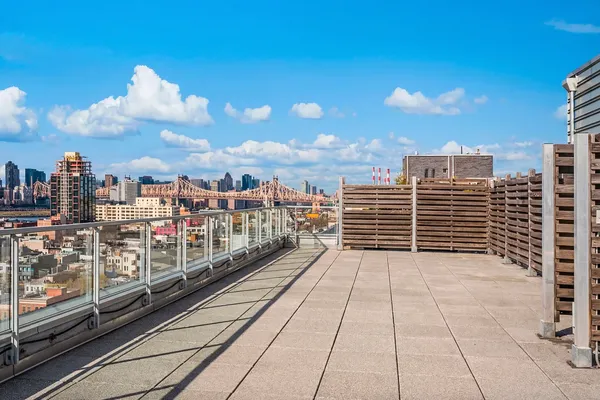 a view of a balcony with city view