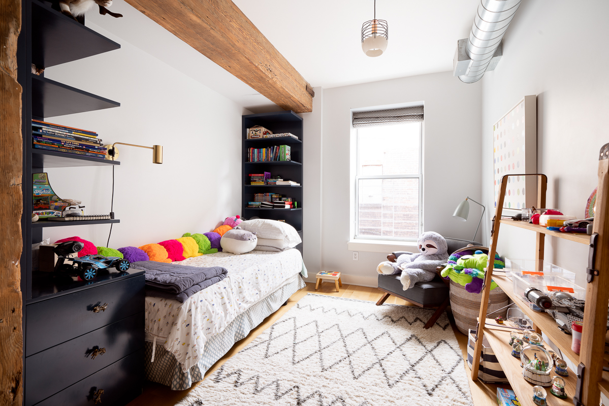 481 Washington Street, Unit 6N Manhattan, NY 10013 - Photo 6 of 10 a bedroom with a bed and a window