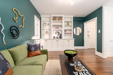 a living room with furniture and rug