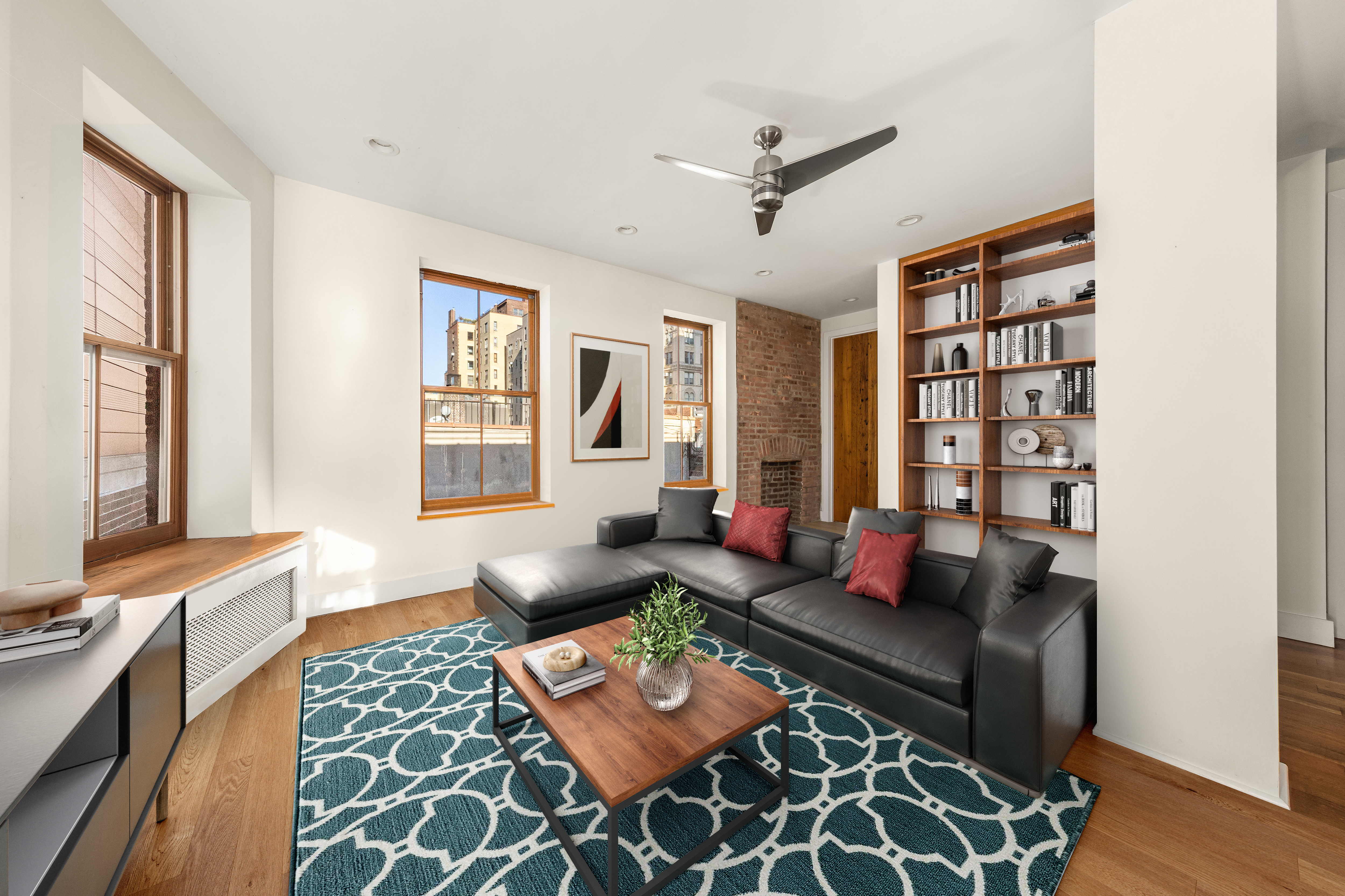 7 West 92nd Street, Unit 76 Manhattan, NY 10025 - Photo 2 of 11 a living room with furniture and wooden floor