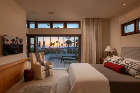 a view of a chairs and table in a terrace
