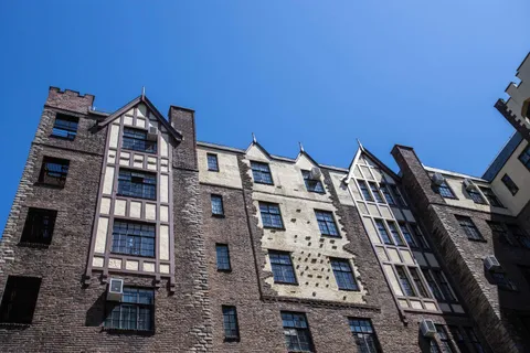 a picture of a bathroom with a sink and mirror