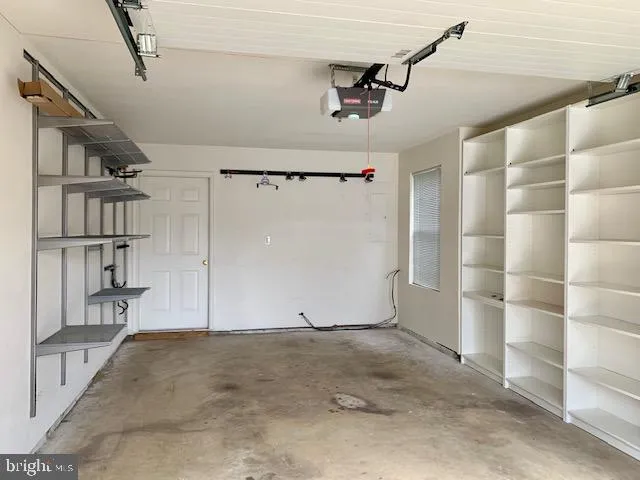 a view of a room with shelves