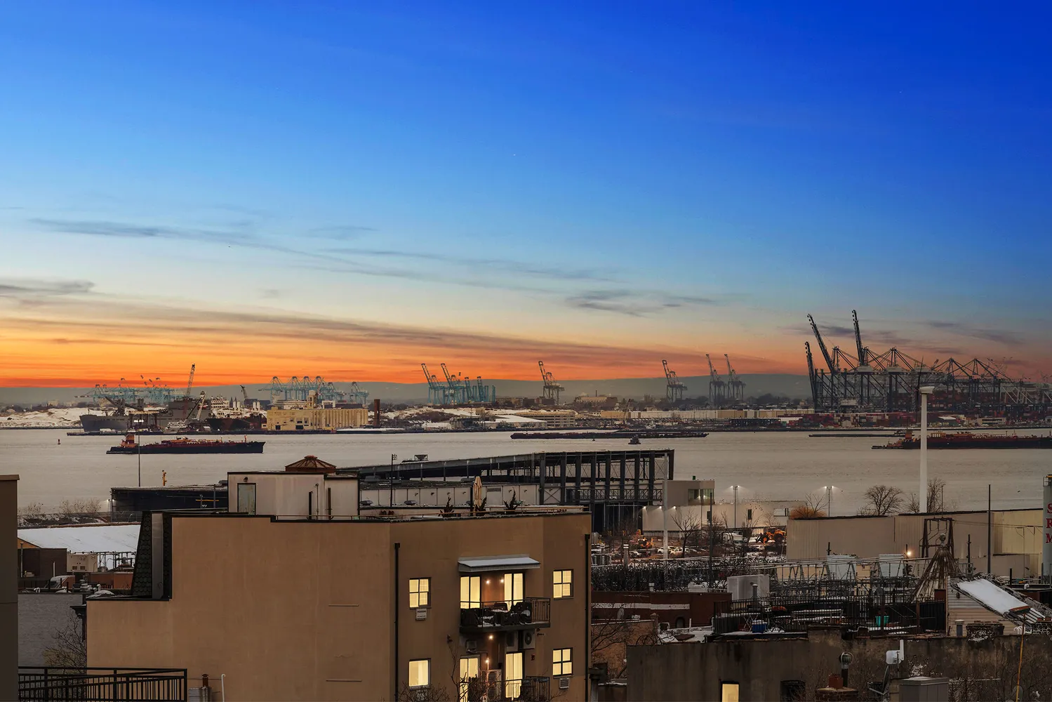 a view of a city and ocean view