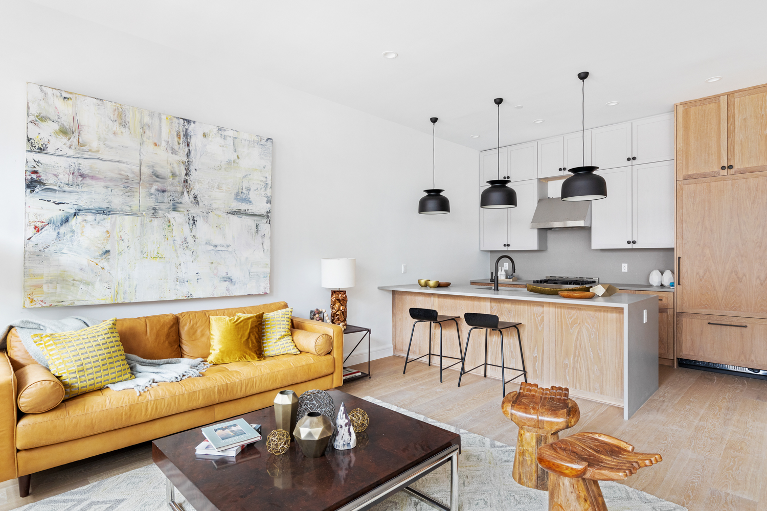 243 North 5th Street, Unit 2B Brooklyn, NY 11211 - Photo 5 of 14 a living room with furniture and kitchen view