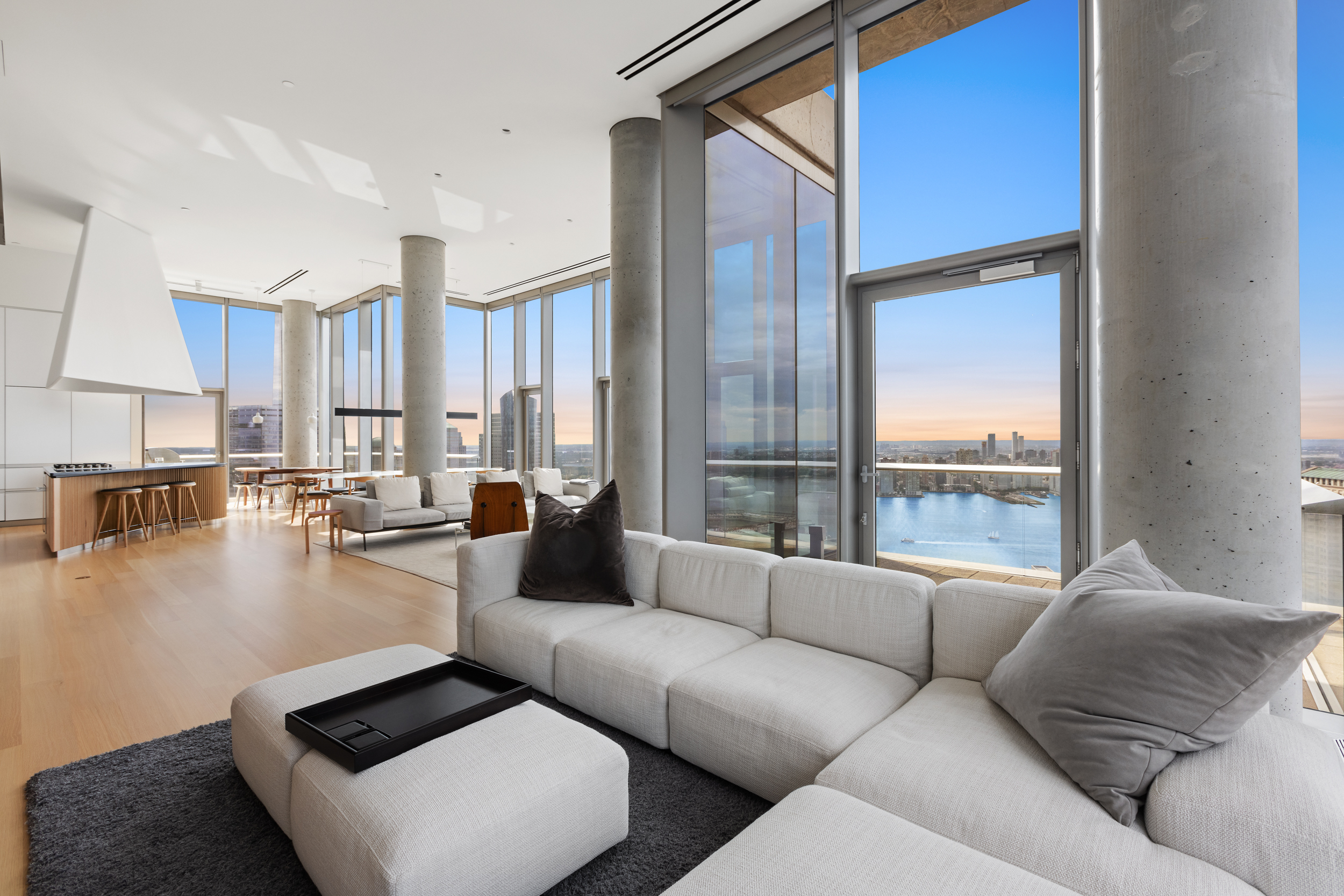 56 Leonard Street, Unit PH52A Manhattan, NY 10013 - Photo 5 of 24 a living room with furniture and a large window