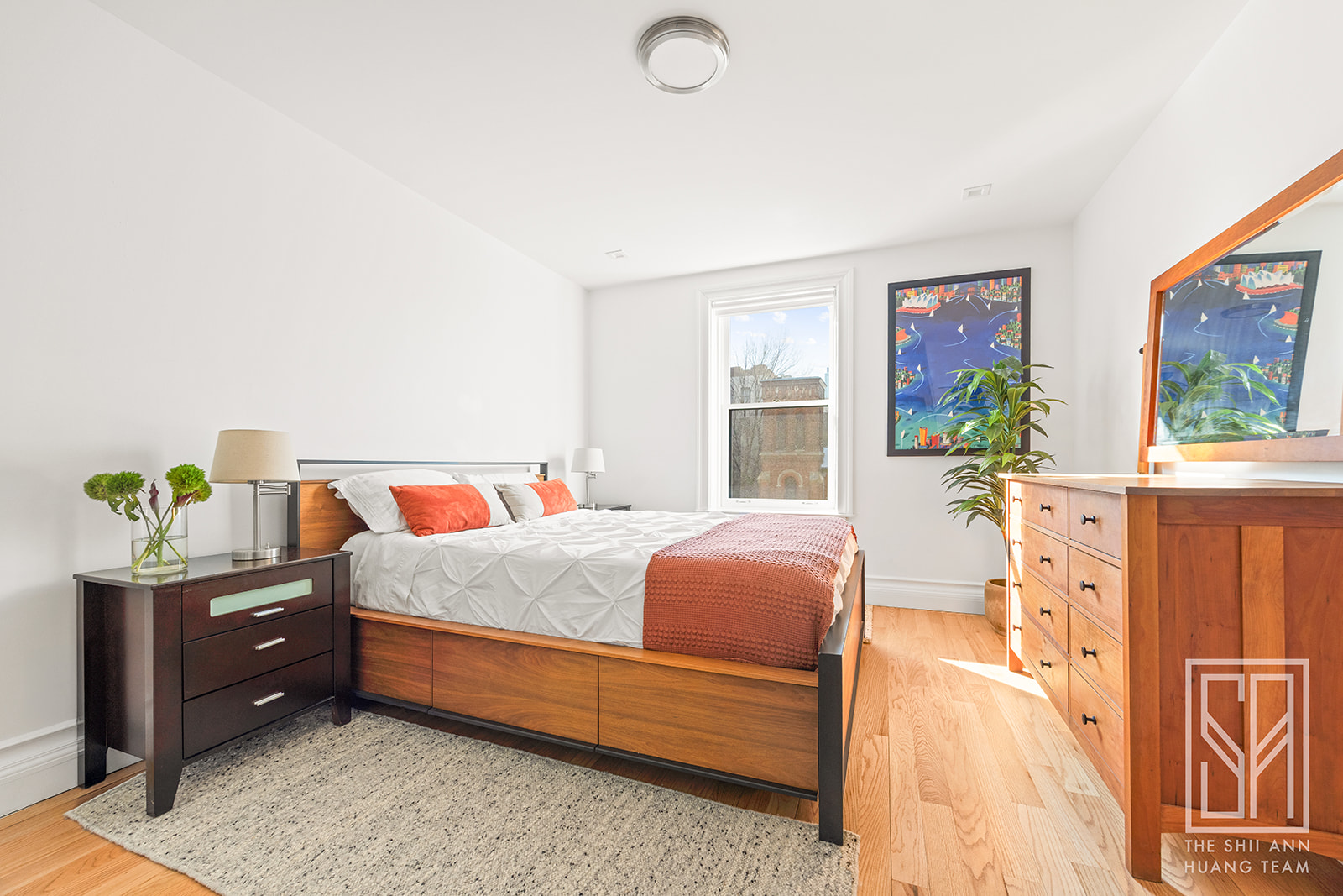 475 Washington Avenue, Unit 4I Brooklyn, NY 11238 - Photo 6 of 10 a bedroom with a bed and a dresser