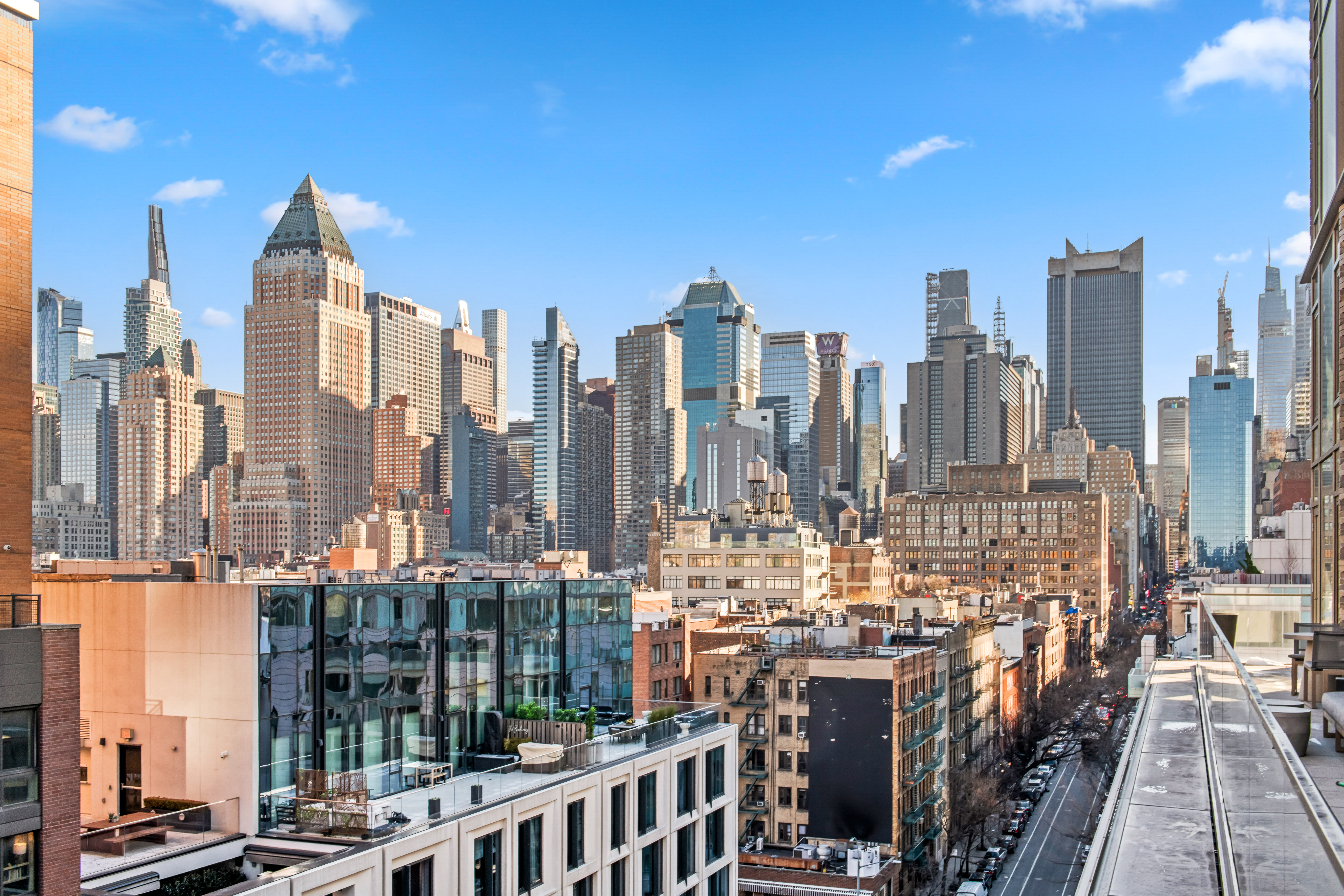 505-513 West 43rd Street, Unit 10B Manhattan, NY 10036 - Photo 6 of 22 a view of city with tall buildings
