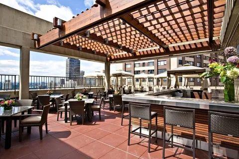 a view of a chairs and table in a patio