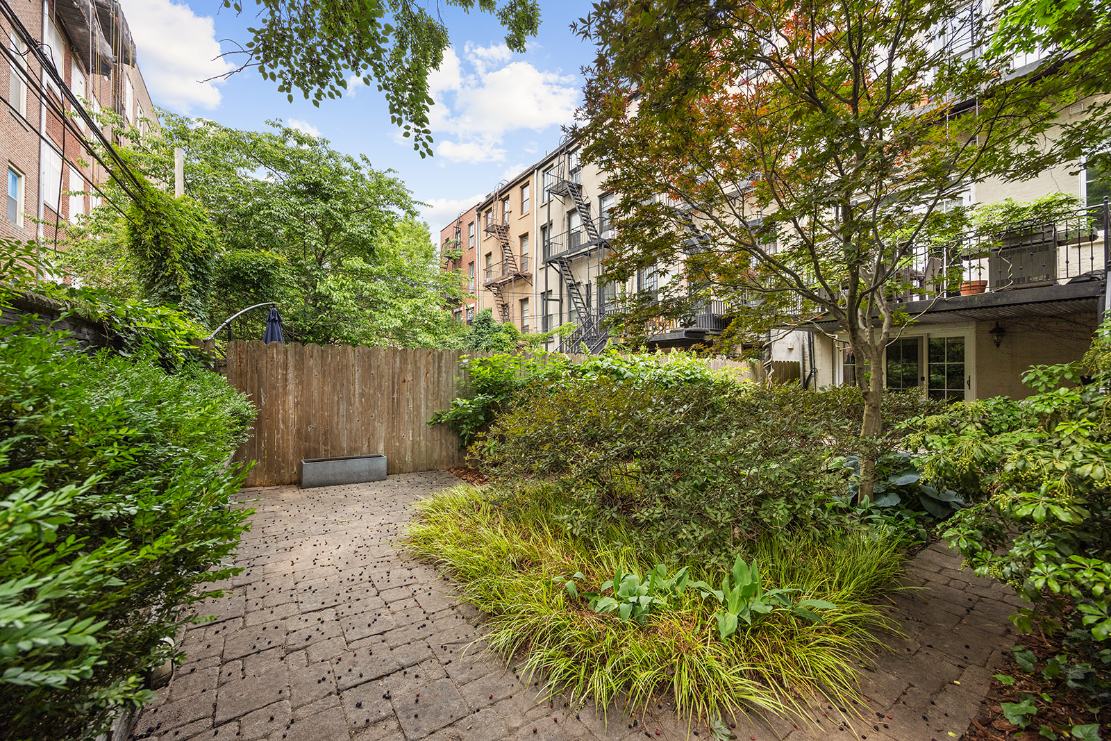 54 Cheever Place Brooklyn, NY 11231 - Photo 7 of 25 a backyard of a house with lots of green space