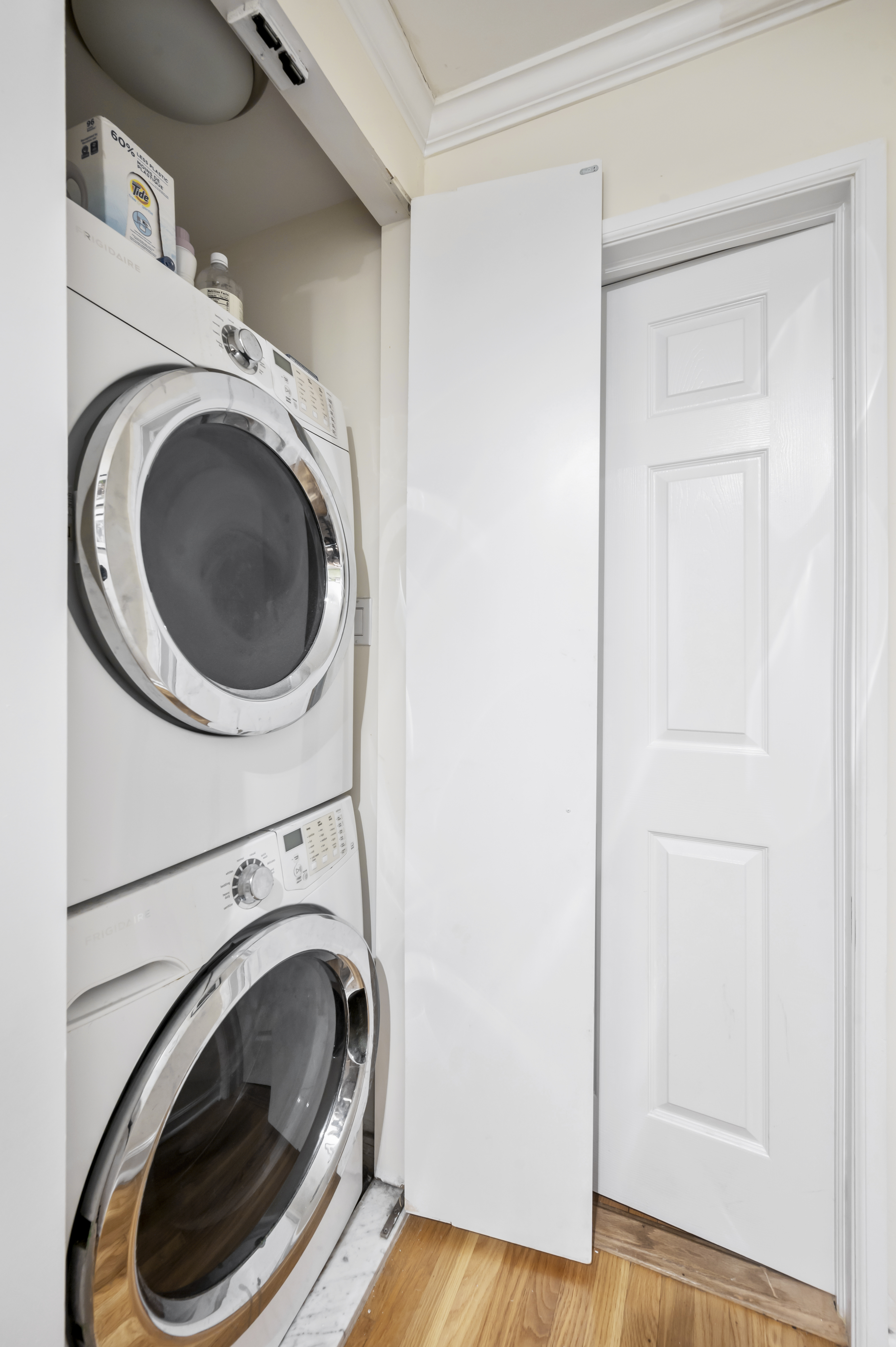 53 West 94th Street Manhattan, NY 10025 - Photo 8 of 12 a utility room with dryer and washer