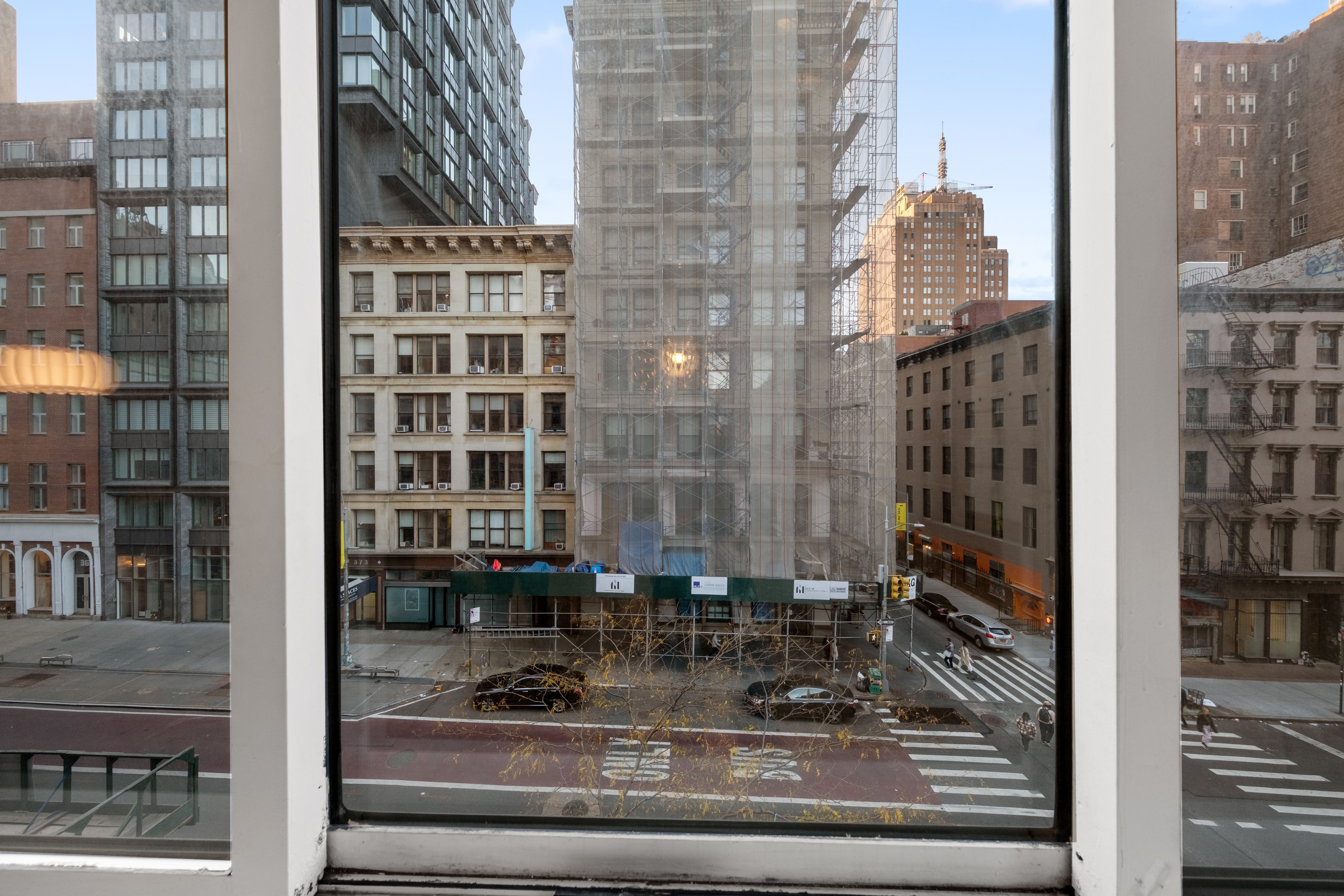 376 Broadway, Unit 4F Manhattan, NY 10013 - Photo 4 of 16 a view of tall buildings