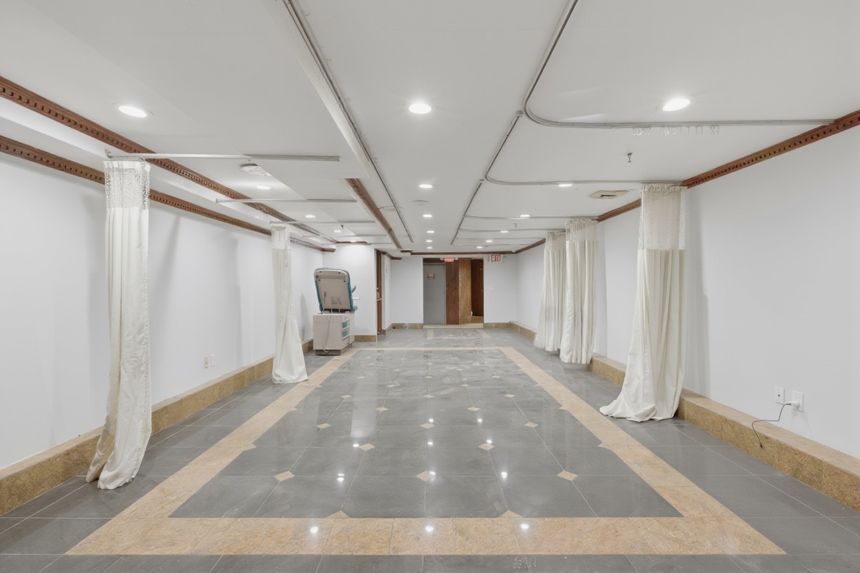 5203-5207 Church Avenue Brooklyn, NY 11203 - Photo 11 of 14 a view of a livingroom with an empty space