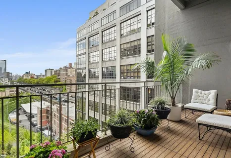 a view of a balcony with couch