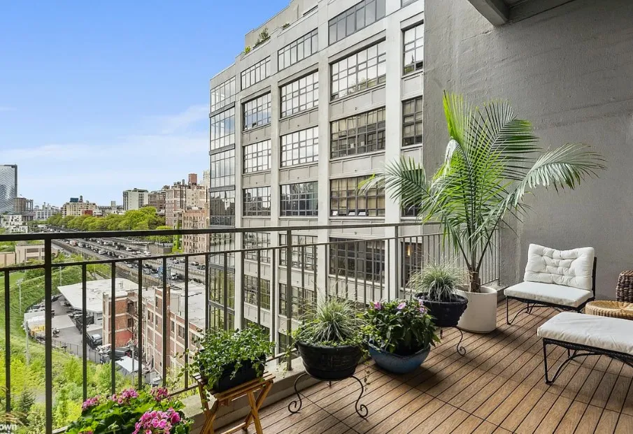 a view of a balcony with couch