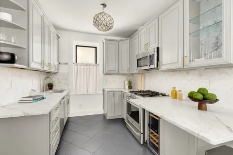 a bedroom with a bed and a lamp