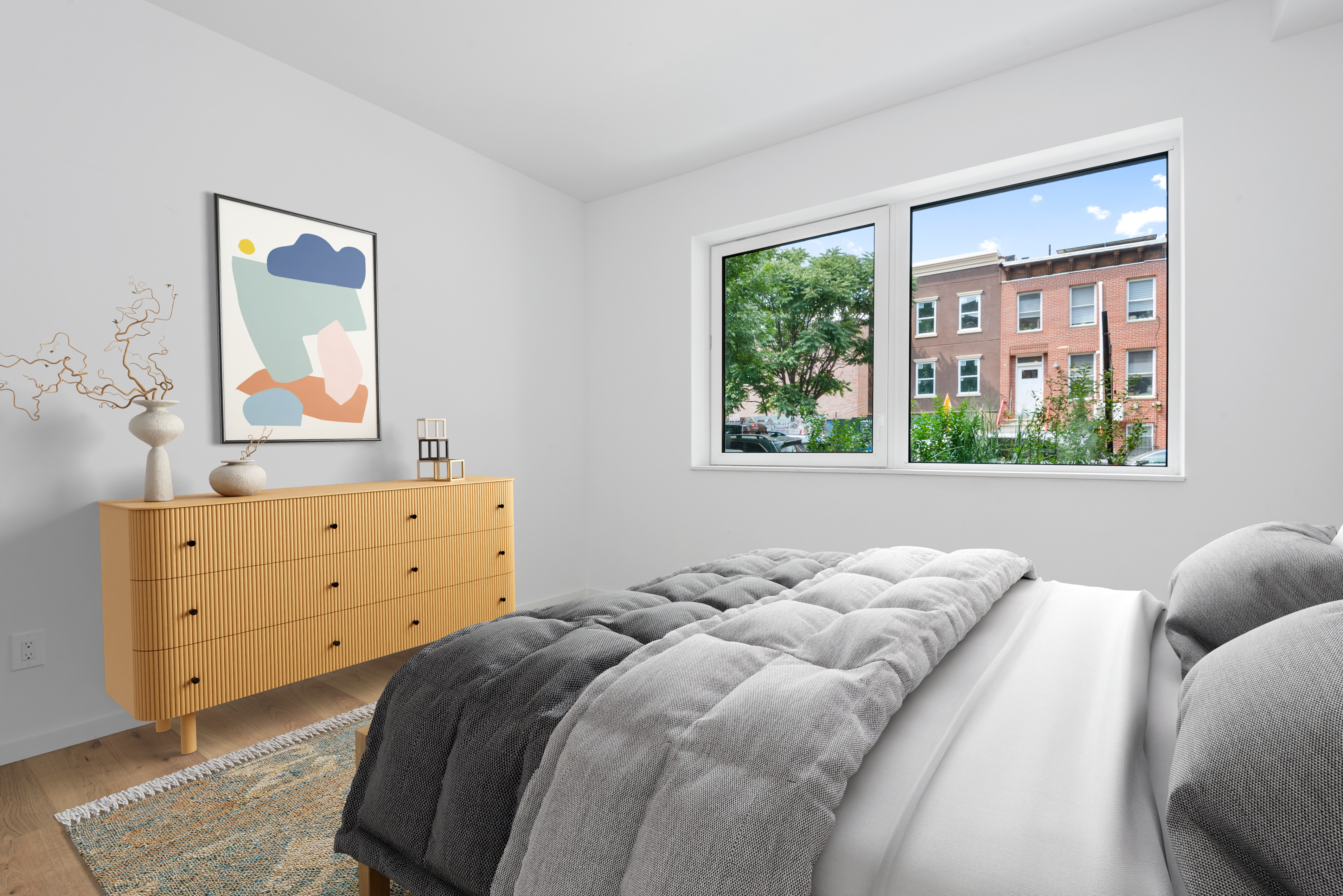702 Hancock Street, Unit 3B Brooklyn, NY 11233 - Photo 6 of 16 a bedroom with a bed and a dresser next to a window