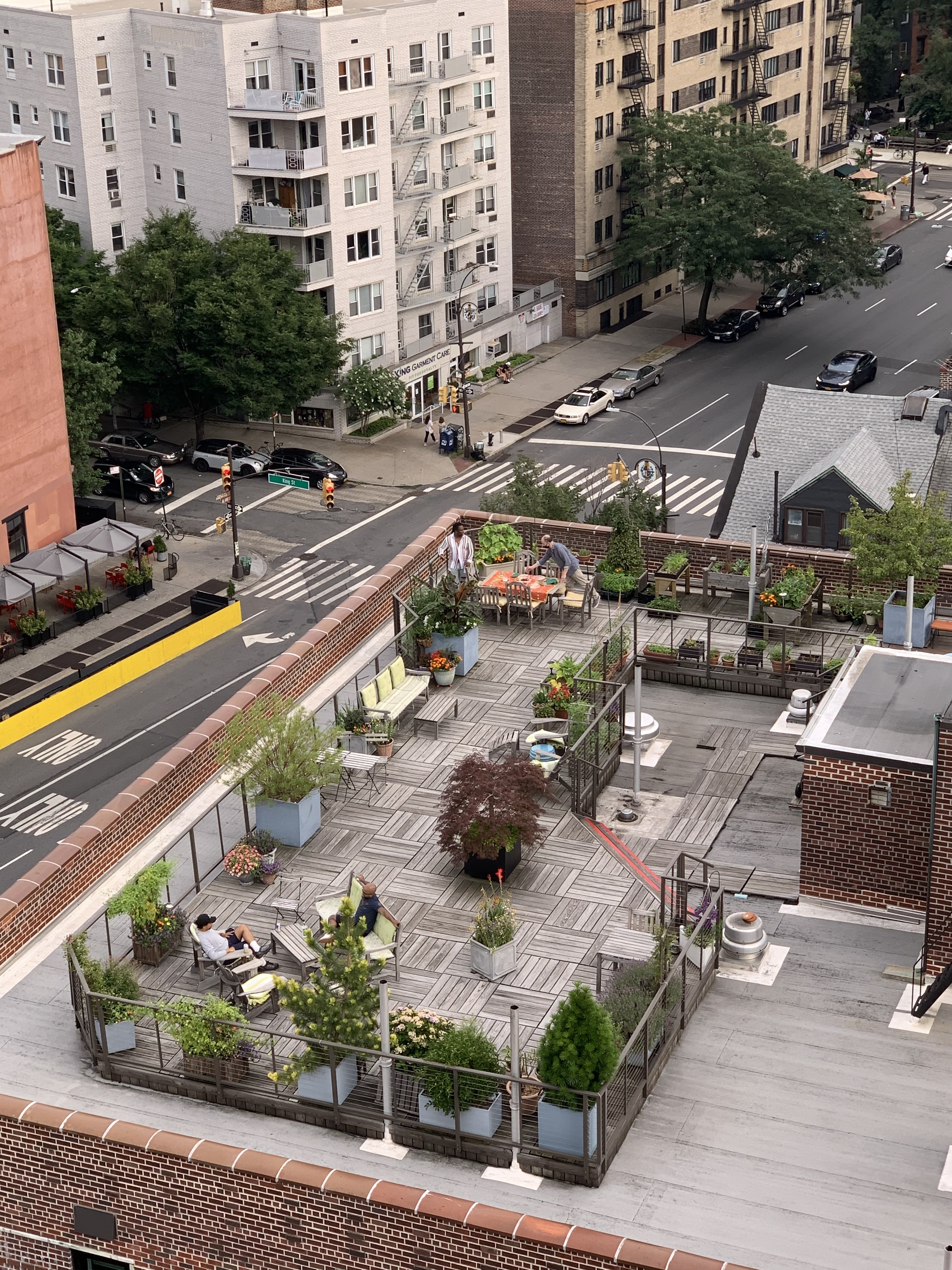 185 West Houston Street, Unit 4H Manhattan, NY 10014 - Photo 10 of 11 a view of a swimming pool with outdoor seating area and green space