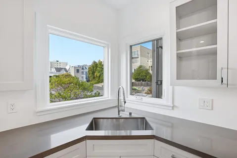 a view of a sink and a mirror