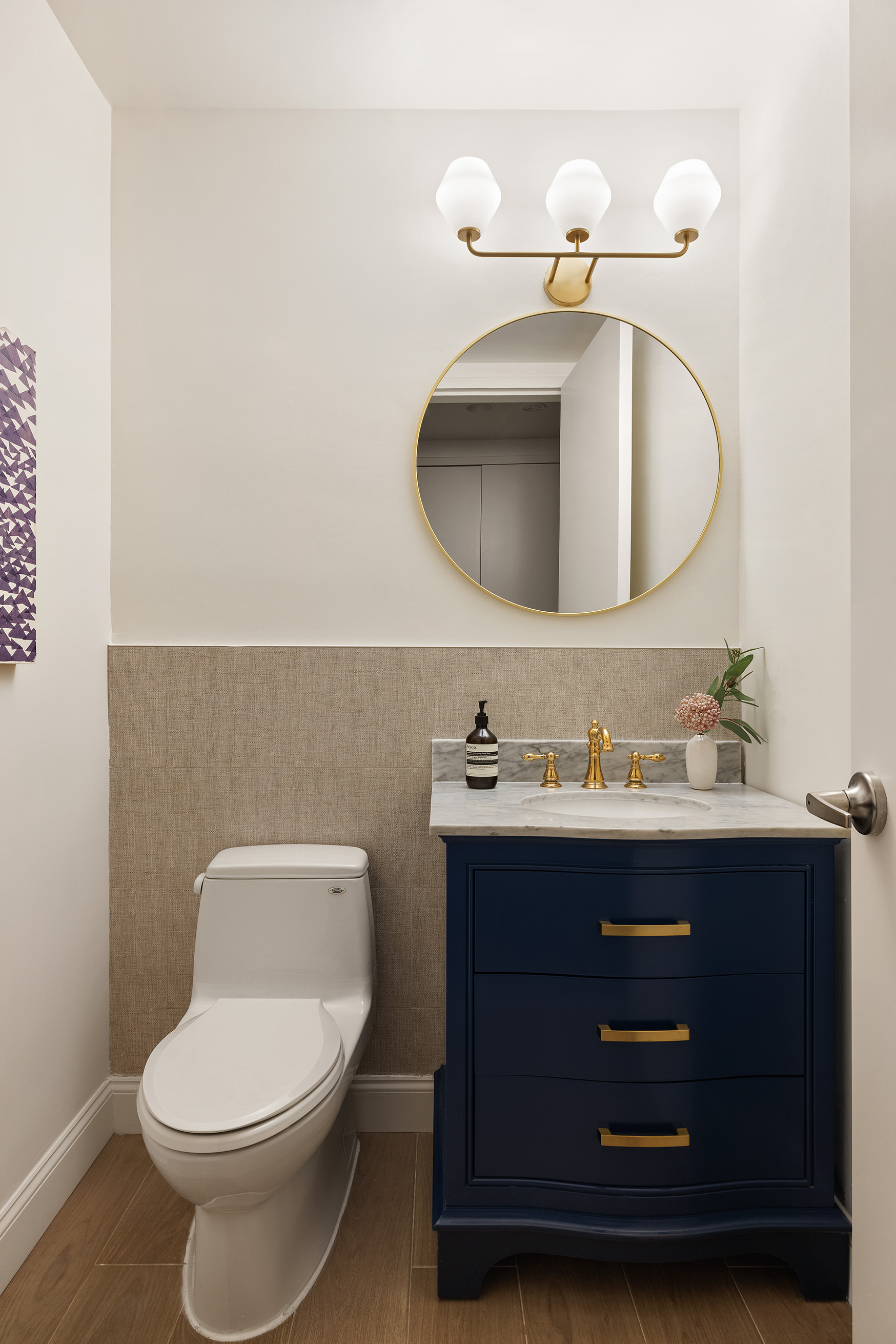 42 East 20th Street, Unit 4AD Manhattan, NY 10003 - Photo 16 of 19 a bathroom with a toilet a sink and mirror