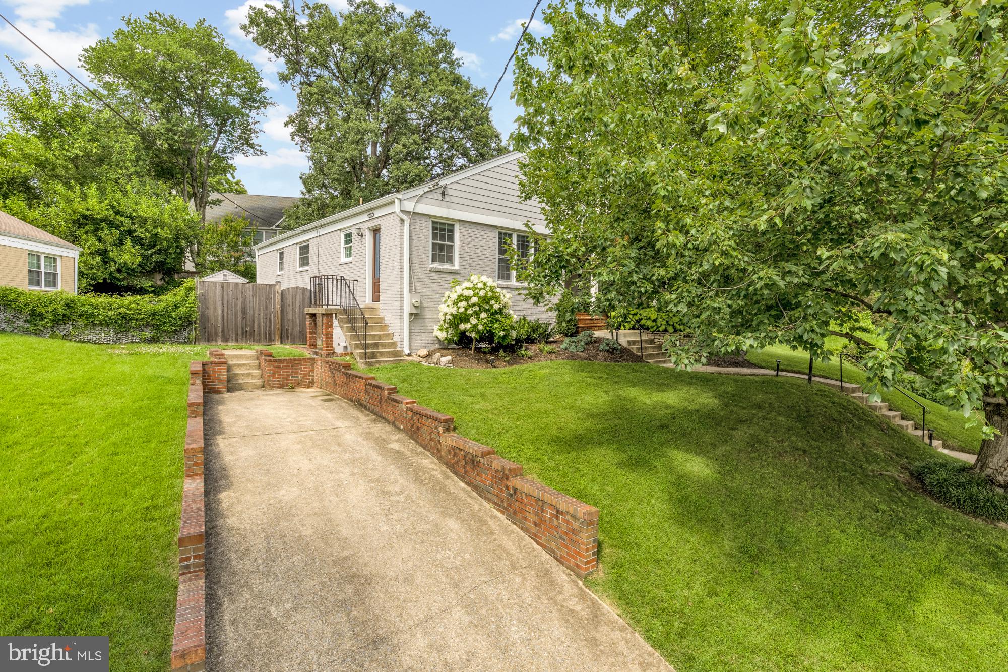 2611 Ross Road Chevy Chase, MD 20815 - Photo 32 of 37 a front view of a house with garden