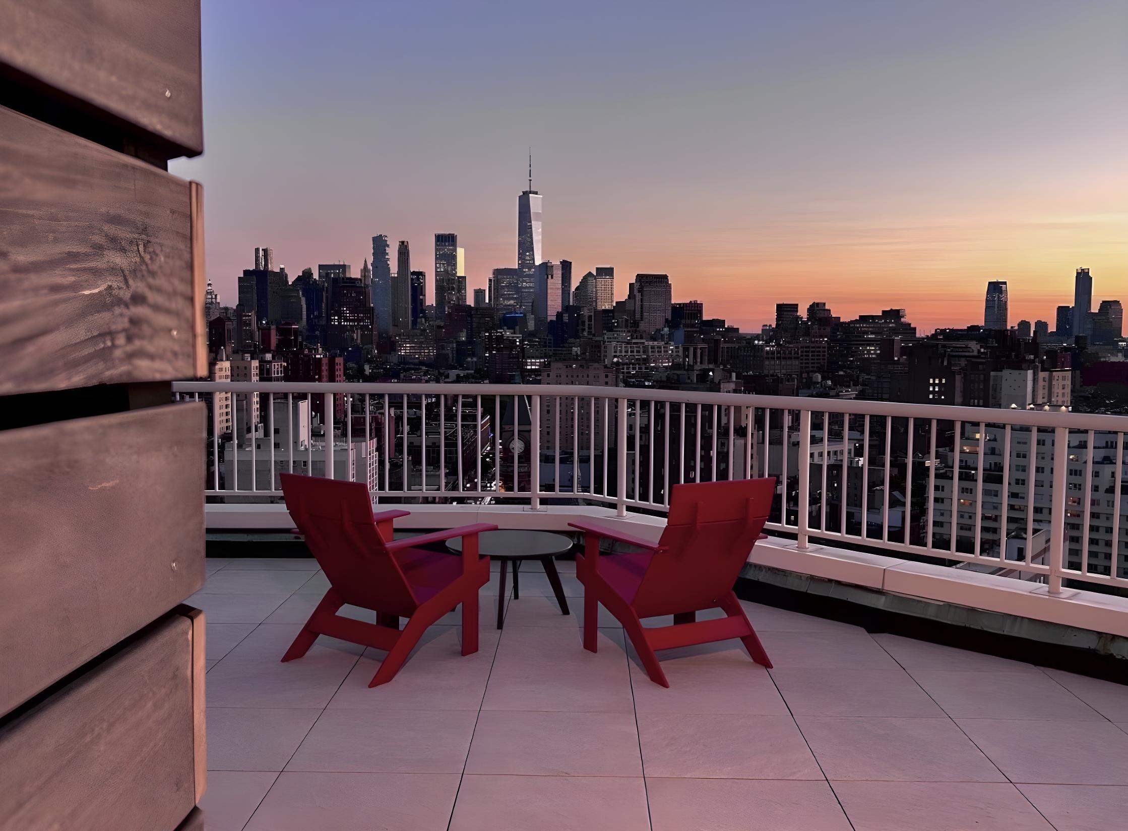 101 West 12th Street, Unit 15P Manhattan, NY 10011 - Photo 12 of 16 a view of a chairs and table on the terrace