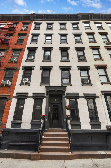 436 East 66th Street, Unit 4E Manhattan, NY 10065 - Photo 14 of 19 a view of a building with many windows