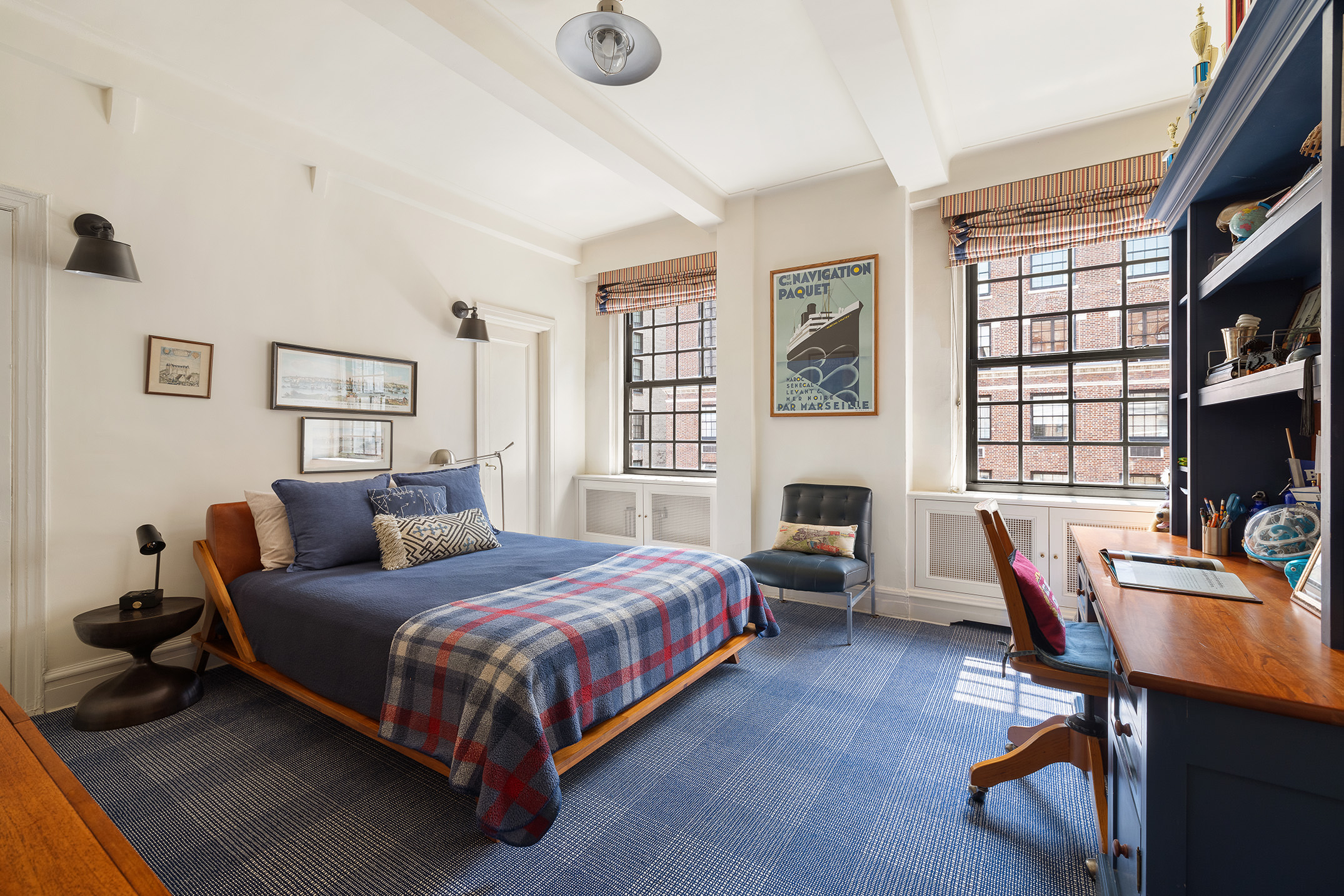 129 East 69th Street, Unit 8/9A Manhattan, NY 10021 - Photo 12 of 16 a bedroom with a bed chair and a window