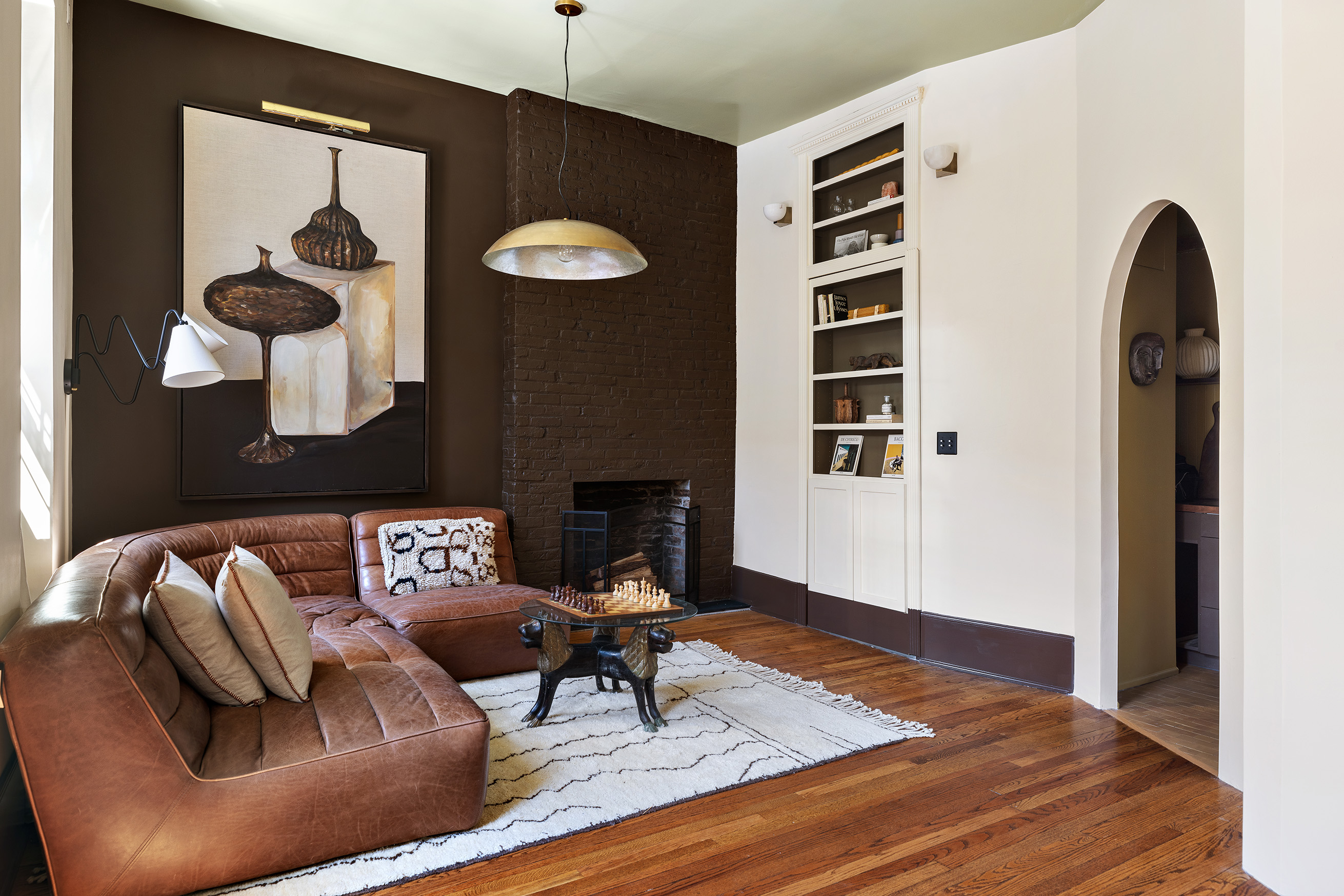 207 West 21st Street, Unit 3F Manhattan, NY 10011 - Photo 4 of 12 a living room with furniture and a wooden floor