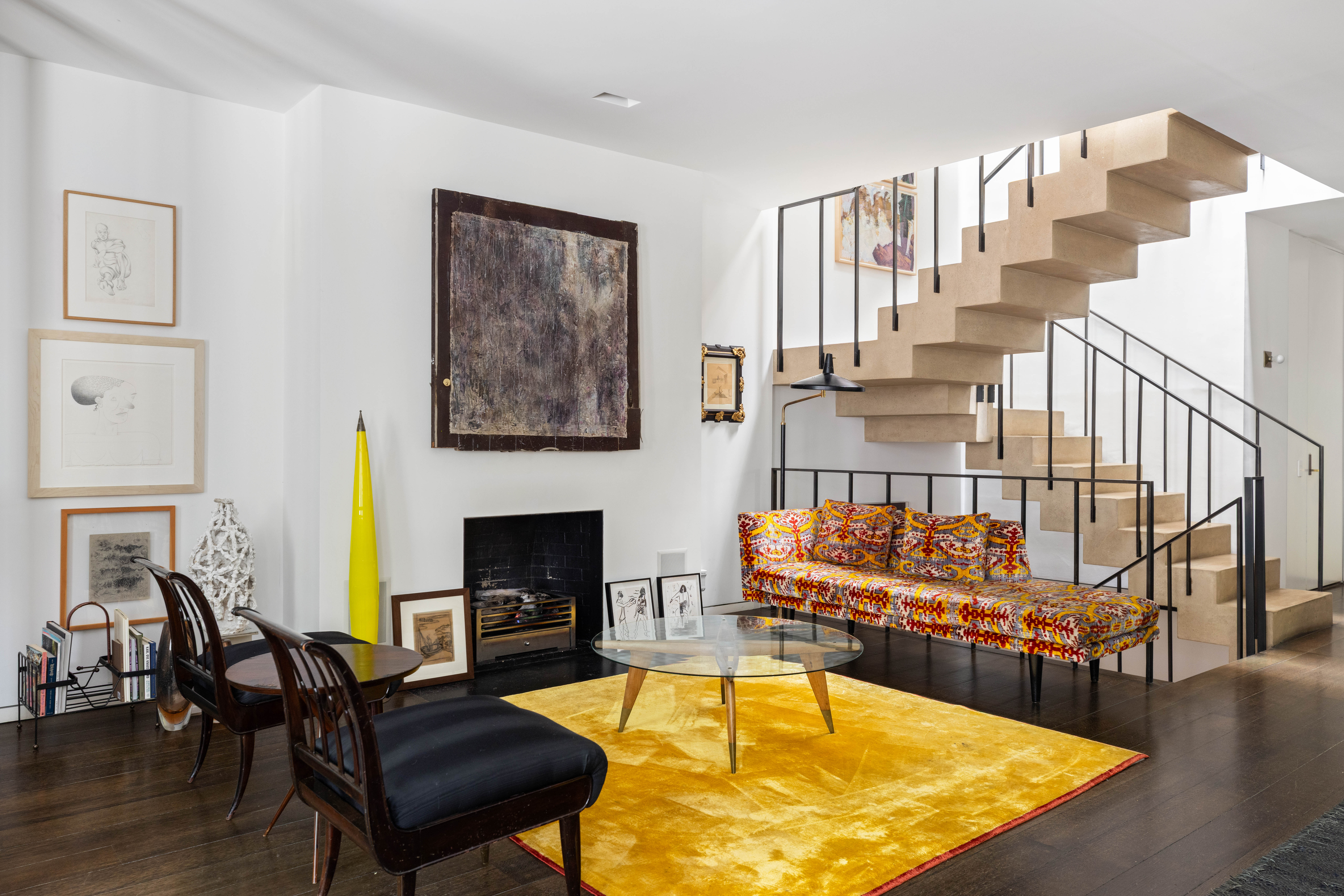 7 MacDougal Alley Manhattan, NY 10011 - Photo 7 of 25 a living room with fireplace furniture and a wooden floor