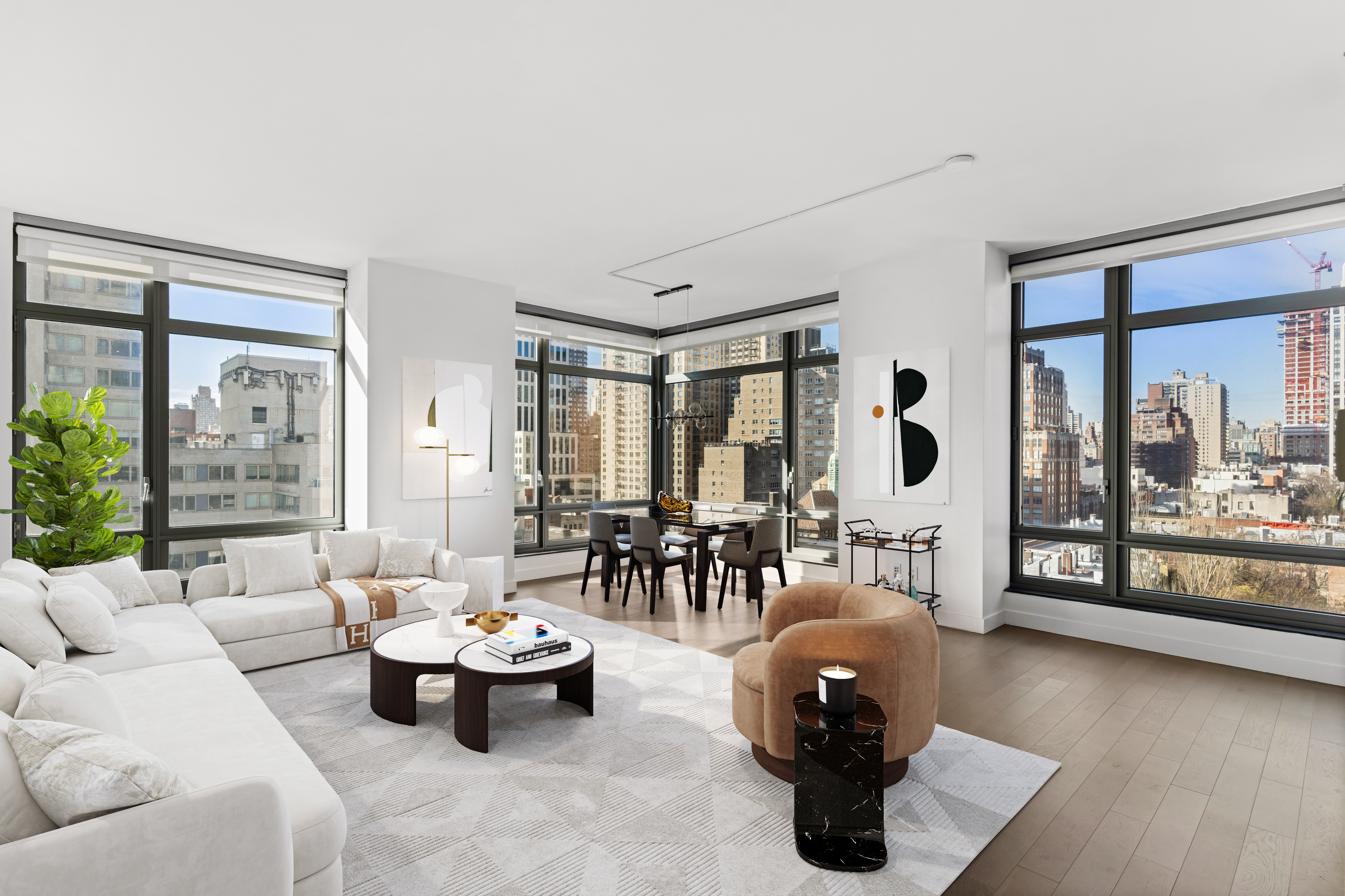 450 East 83rd Street, Unit 9E Manhattan, NY 10028 - Photo 1 of 18 a living room with furniture and a large window