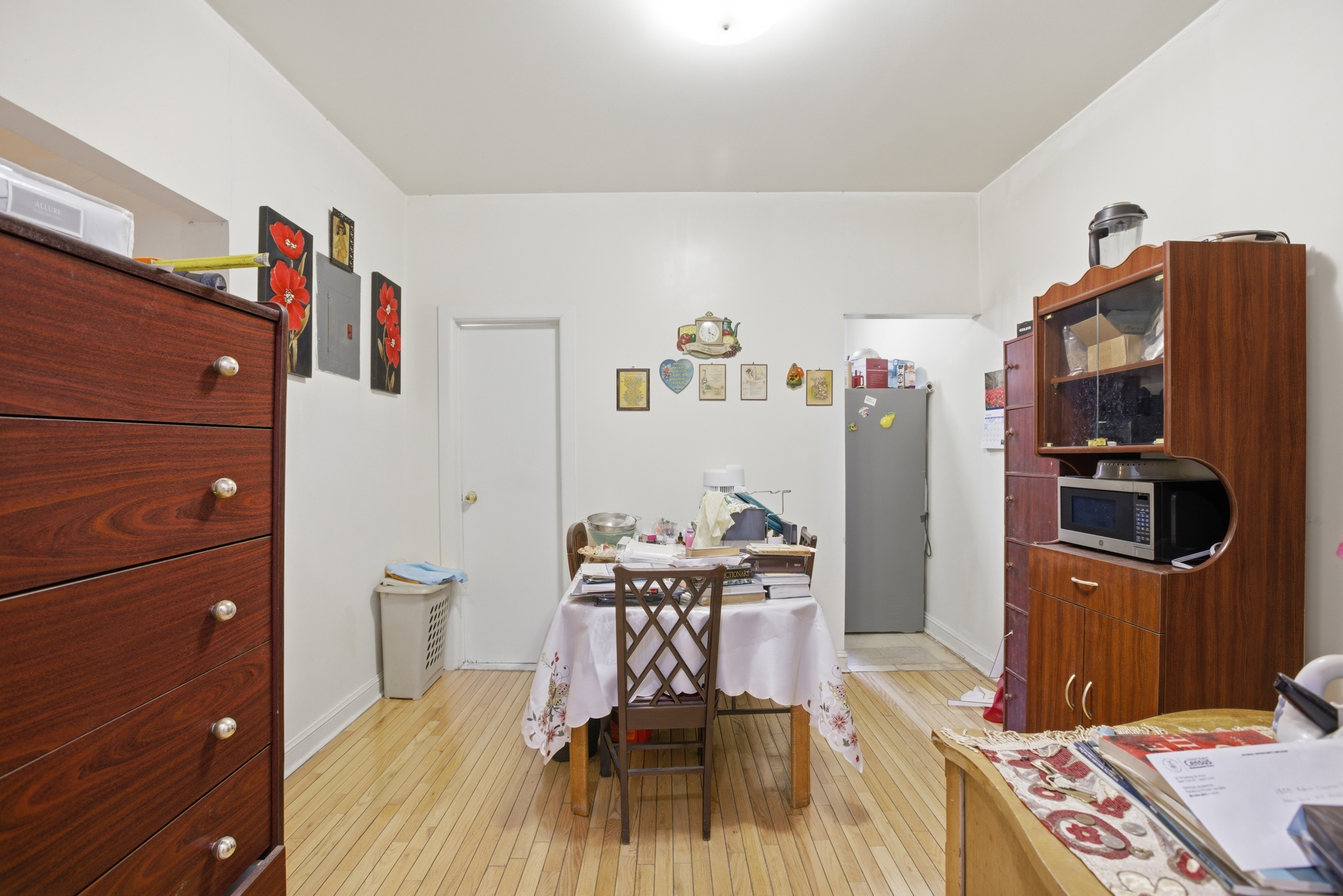 1809 Adam Clayton Powell Jr Boulevard, Unit 2D Manhattan, NY 10026 - Photo 6 of 15 a view of a workspace with furniture and a flat screen tv