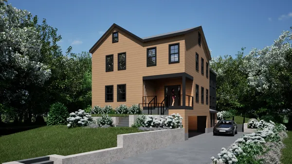 a front view of a house with a yard