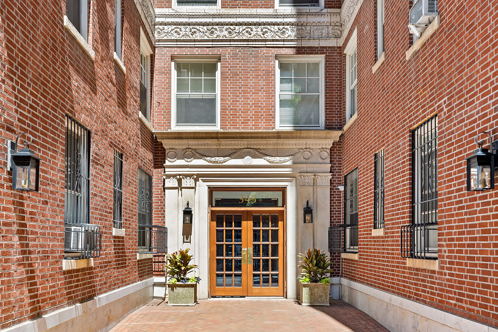 345 West 55th Street, Unit 8AB Manhattan, NY 10019 - Photo 13 of 14 a view of a building with a large window