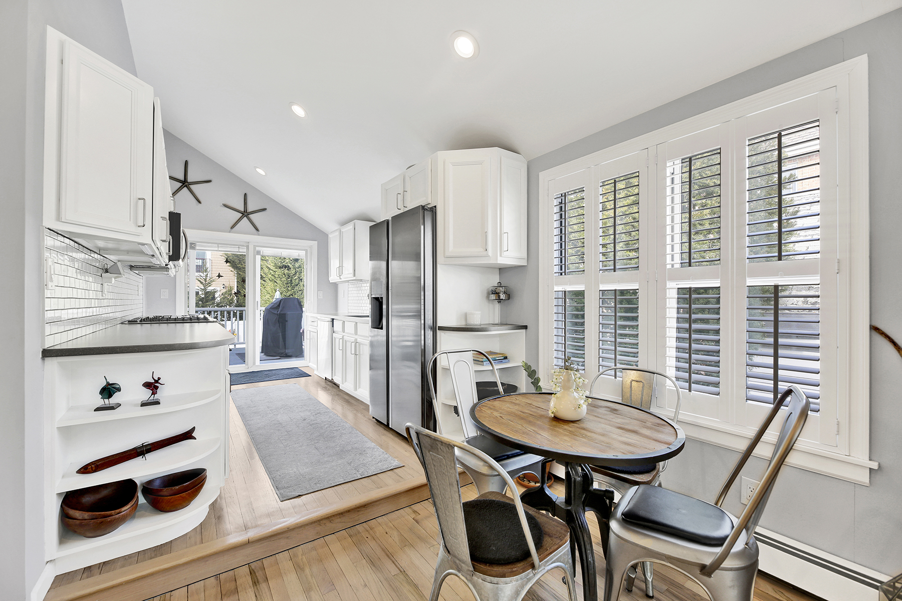 4-53 Beach 142nd Street Queens, NY 11694 - Photo 12 of 39 a view of a dining room with furniture and a table