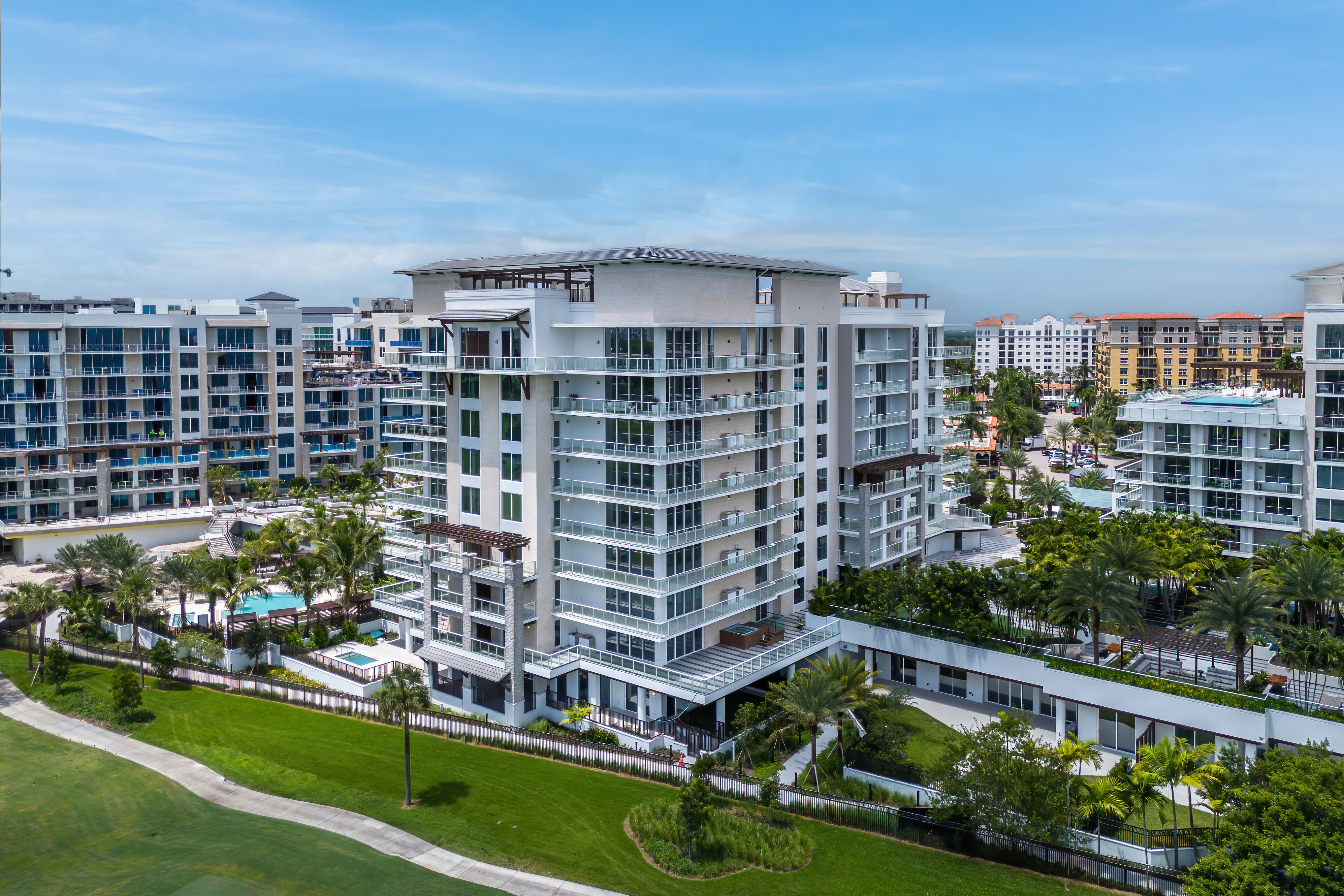 210 Southeast Mizner Boulevard, Unit 101 Boca Raton, FL 33432 - Photo 6 of 31 a view of building with yard