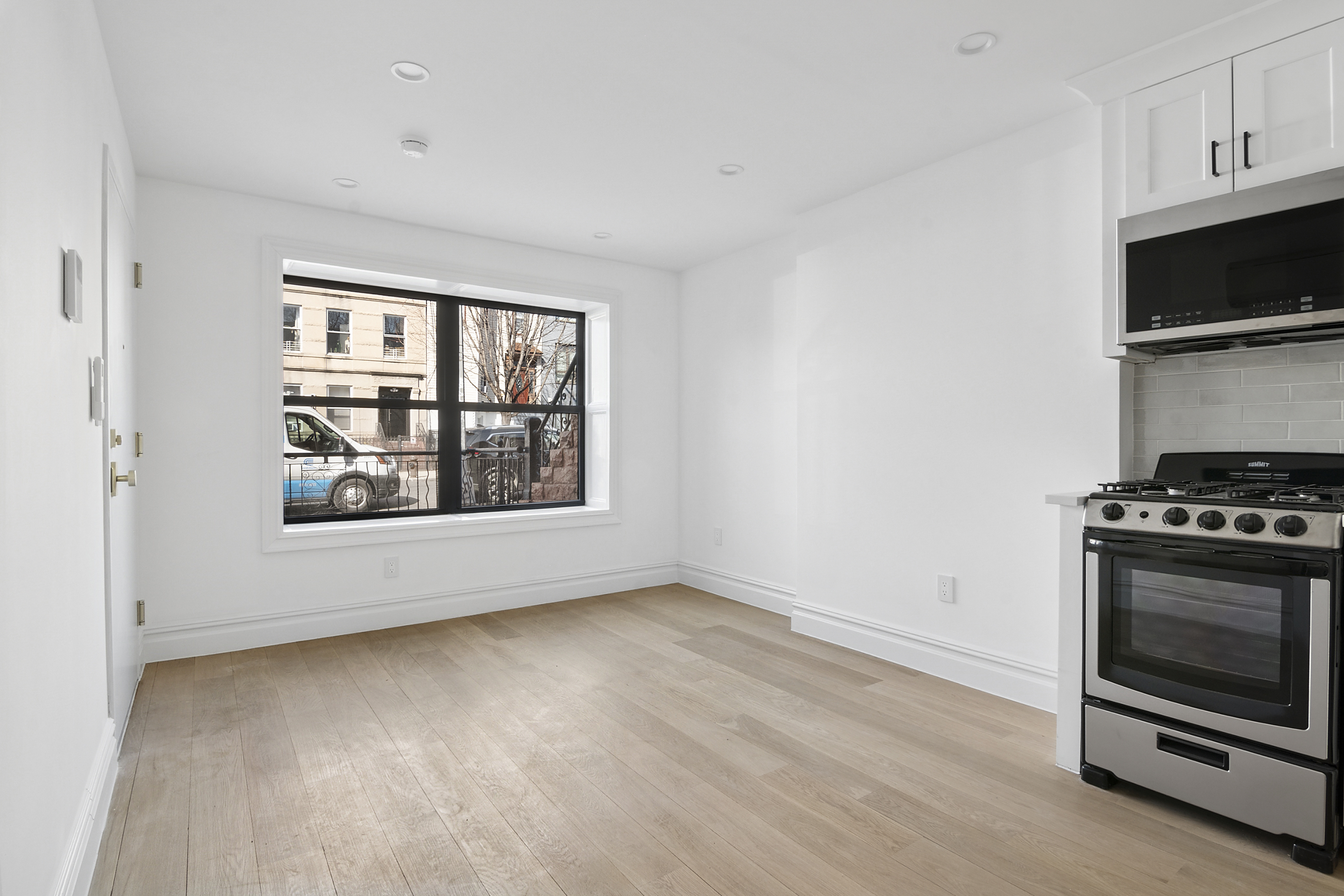 716 Decatur Street, Unit 1 Brooklyn, NY 11233 - Photo 2 of 7 a view of kitchen with a stove top oven