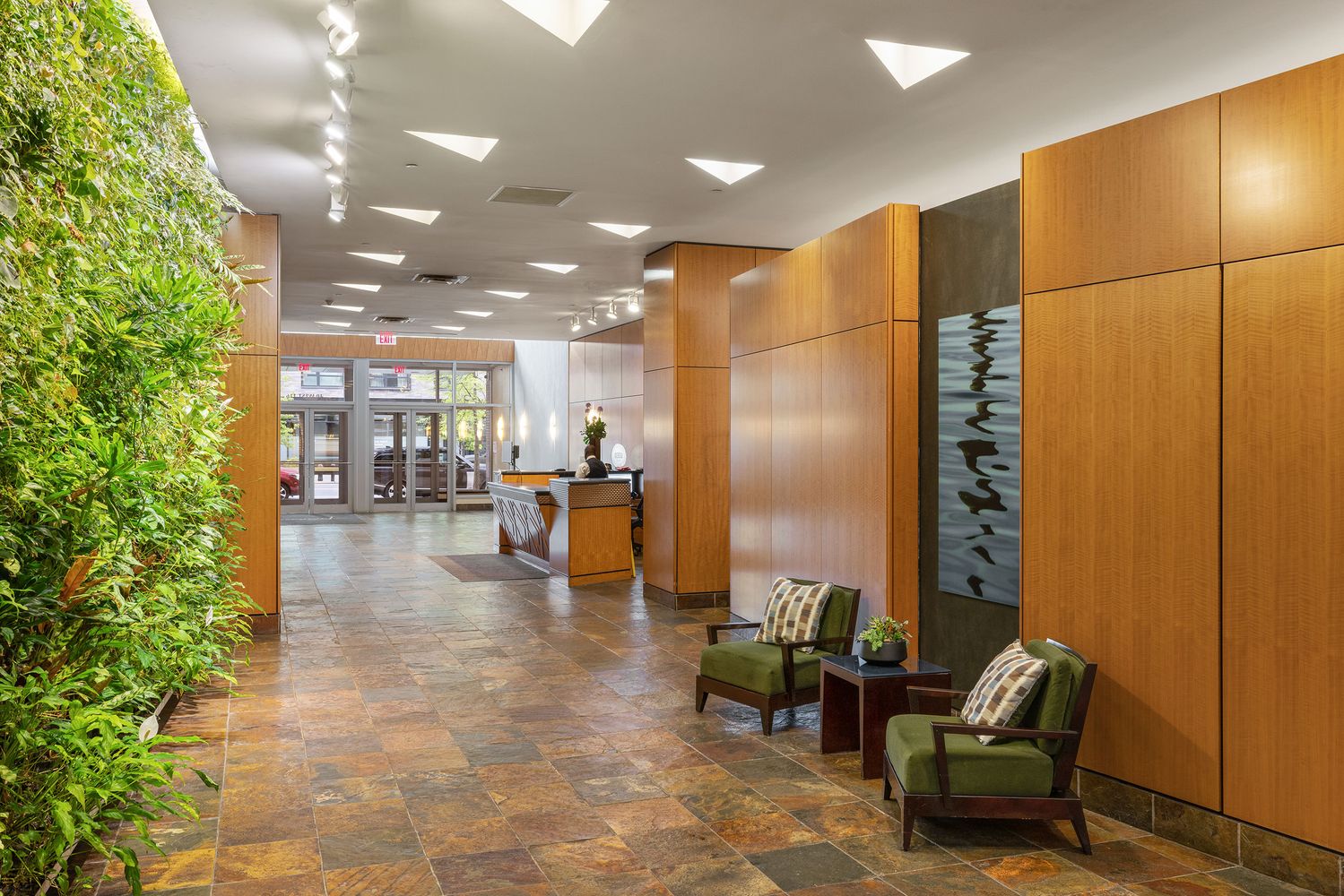 40 West 116th Street, Unit B503 Manhattan, NY 10026 - Photo 16 of 36 a lobby with a couch and chairs