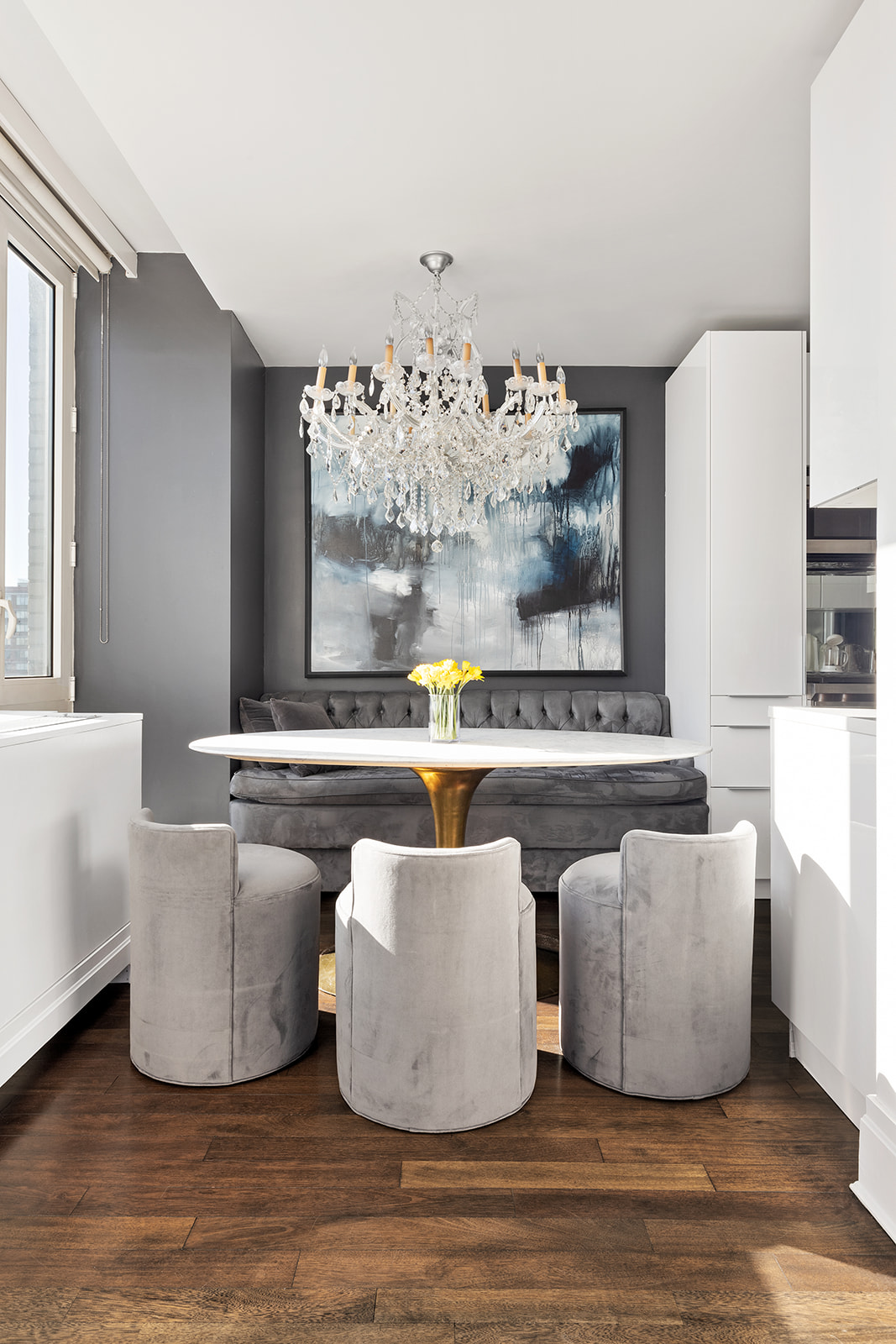 300 East 77th Street, Unit 18C Manhattan, NY 10075 - Photo 4 of 12 a living room with furniture and a large window