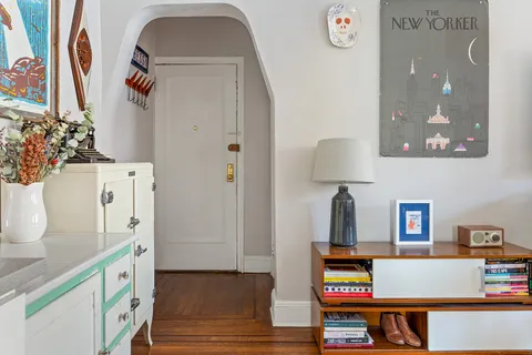 a living room with furniture and a table