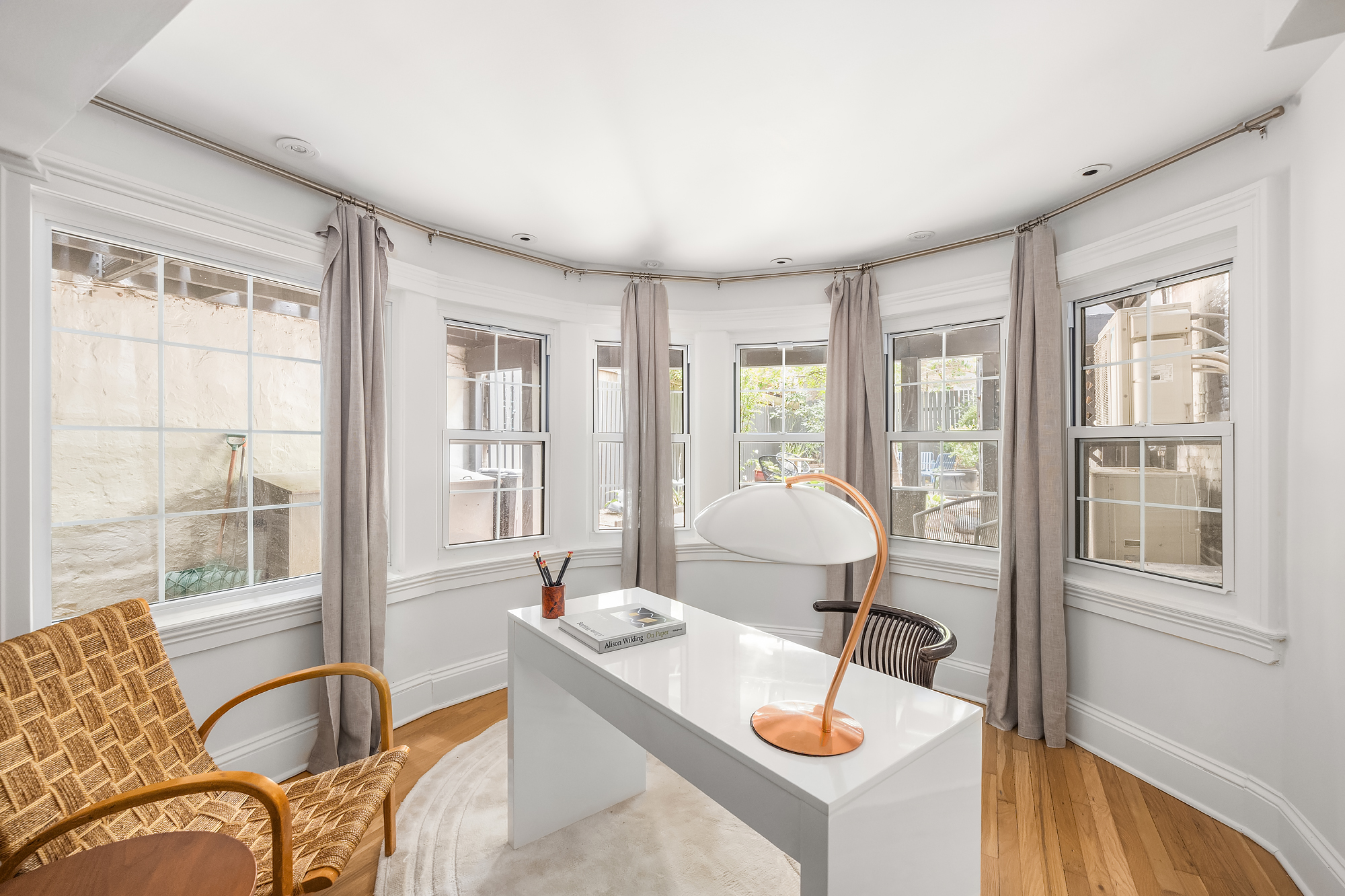 112 West 13th Street Manhattan, NY 10011 - Photo 42 of 46 a living room with furniture and window