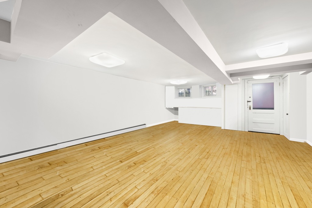 524 3rd Street Brooklyn, NY 11215 - Photo 16 of 18 a view of empty room with wooden floor