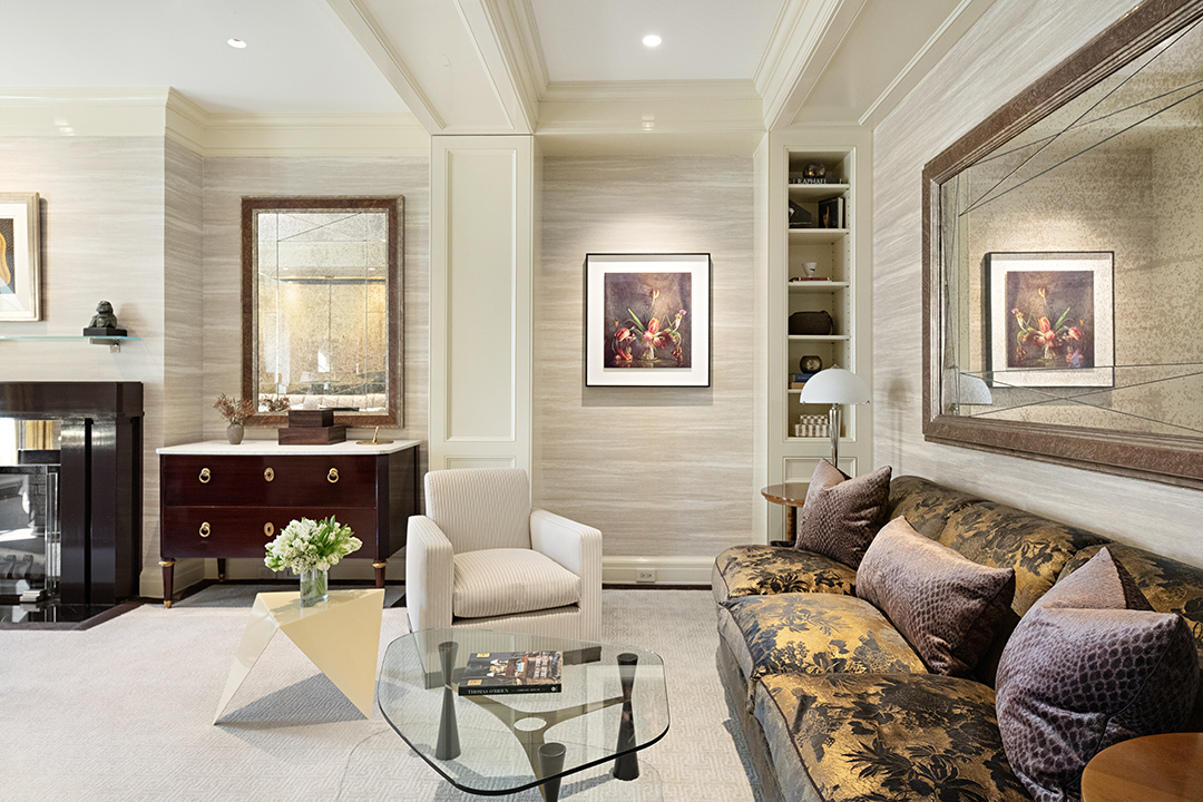 730 Park Avenue, Unit 7/8A Manhattan, NY 10021 - Photo 14 of 26 a living room with furniture and fireplace