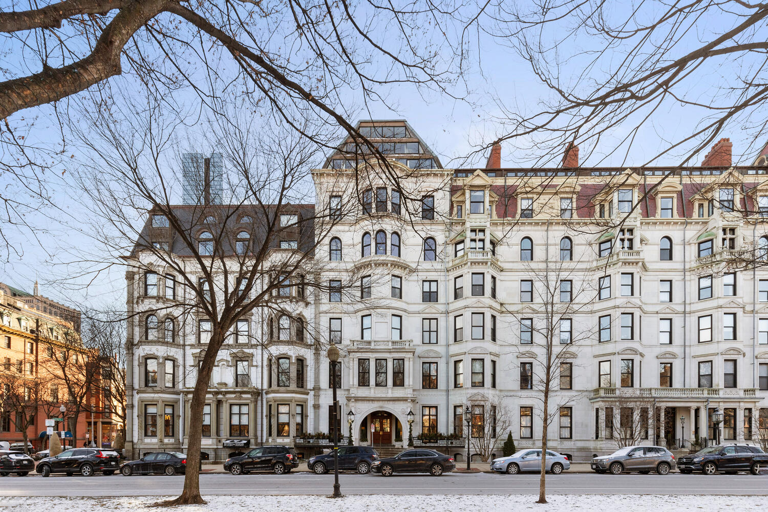 160 Commonwealth Avenue, Unit 410 Boston, MA 02116 - Photo 27 of 31 a front view of a building with lot of cars and trees