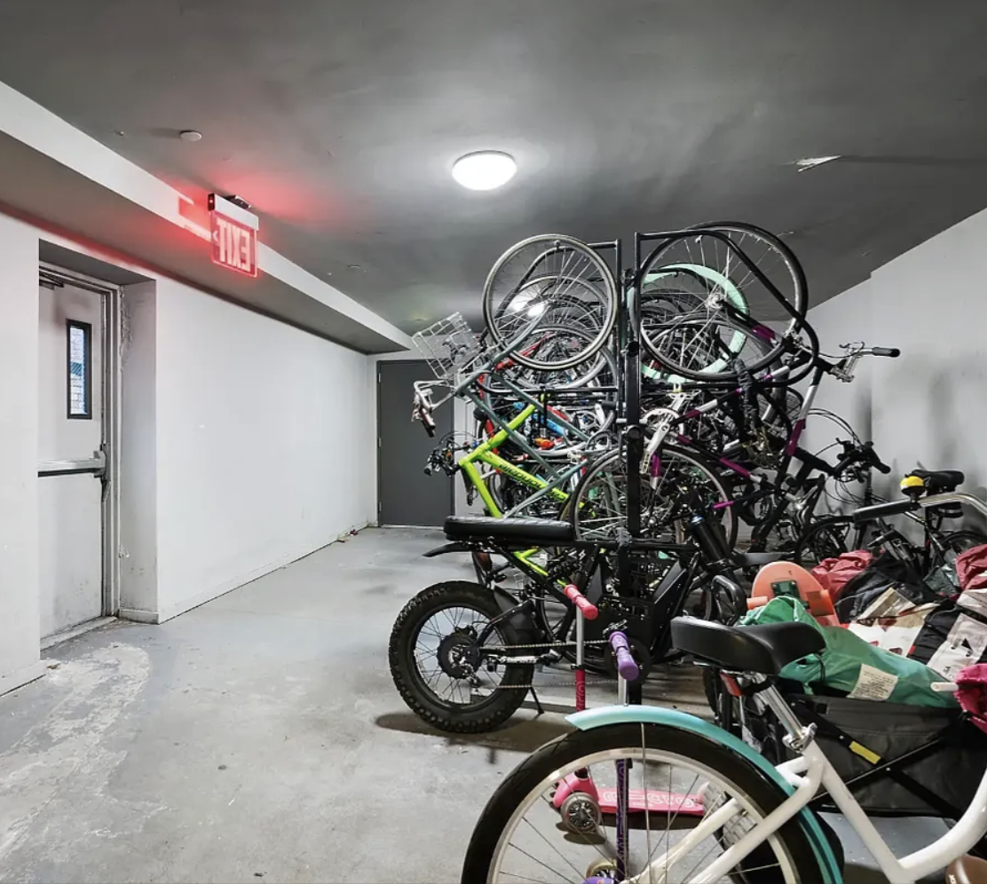 180 Bainbridge Street, Unit 304 Brooklyn, NY 11233 - Photo 20 of 21 a view of a garage with a bike