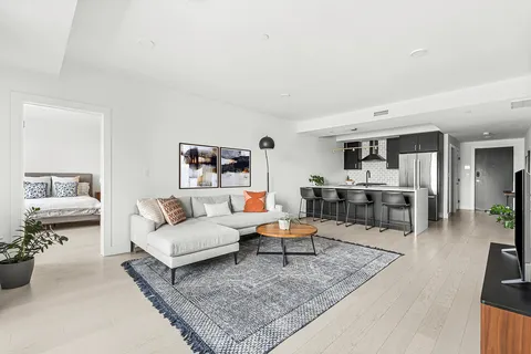 a living room with furniture and a couch