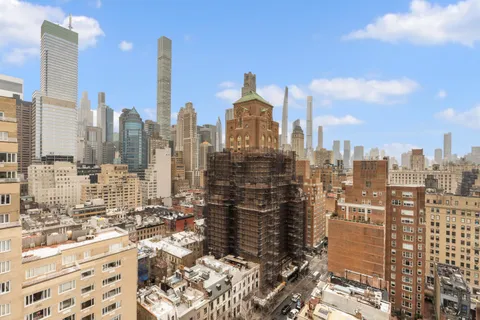 a view of a city with tall buildings